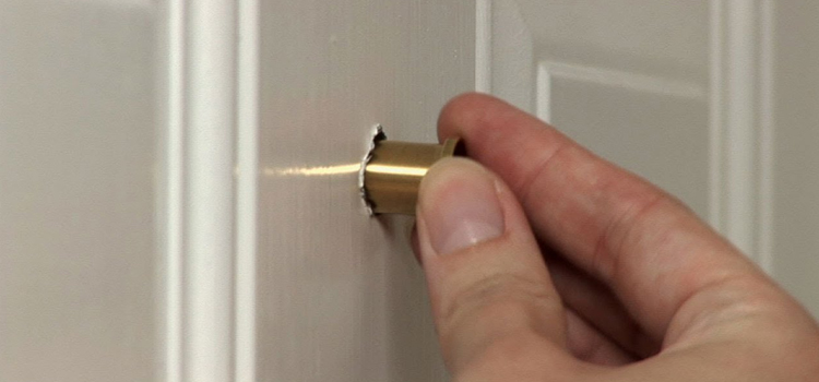peephole door repair in Commerce